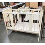 A vintage pedigree child's / baby's cot with animal depictions