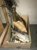 A box of feathers including pheasant, peacock etc.