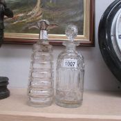 2 old glass decanters.