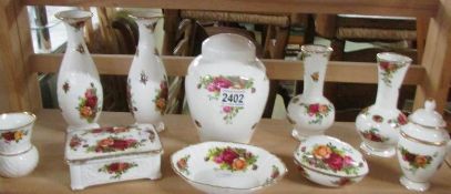 10 pieces of Royal Albert Old Country Roses including vases, trinket box, lidded pot etc.