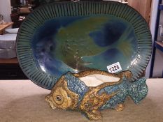 An art pottery fish planter and a terracotta meat plate