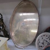 A large oval silver plated gallery tray.