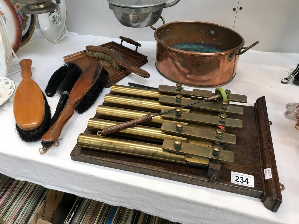 A brass xylophone, copper pan,