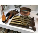 A brass xylophone, copper pan,