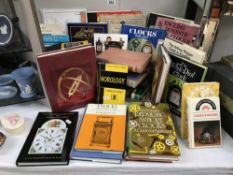 A large quantity of vintage books on clocks and watches