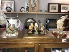 A set of 6 Royal Doulton owl figures with stand, Royal Doulton Osprey DA139 with stand,