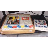 A vintage wooden box of Lego with contents and a vintage boxed Lego motor kit