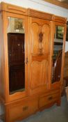 An Edwardian satin walnut wardrobe in good condition.