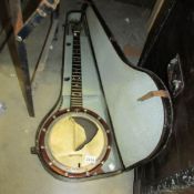 A cased banjo, a/f.