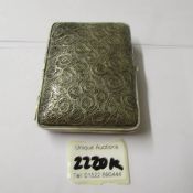 A good quality filigree cigarette case (possibly silver but not marked).