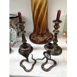 A pair of Georgian copper candlesticks and a pair of Indian brass cobra candlesticks