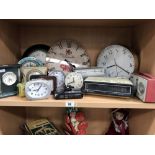 A quantity of alarm clocks and radios