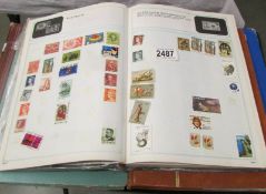4 albums of stamps including a good Greek selection.