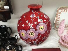 A large floral pottery lamp base