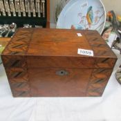 An inlaid sewing box and contents.