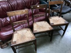 3 oak dining chairs with cane seat panels