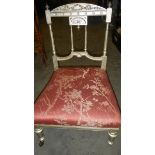 A painted nursing chair.