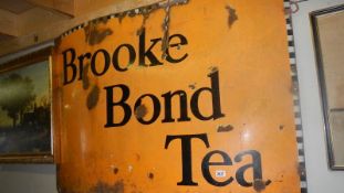 A Brooke Bond Tea enamel signed, approximately 60 x 40 inches.