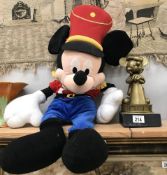 A Mickey Mouse cuddly toy and 1 other Mickey Mouse item