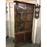 A mid 20th century astragal glazed corner cupboard