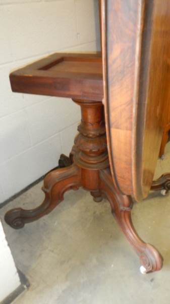 A good Victorian oval centre pedestal walnut tip top table. - Image 2 of 2