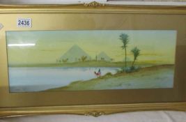 A fine watercolour 'The Nile with Pyramids in Background' signed Harris Brett.