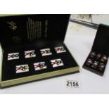 A cased Golly's Diary 2001 together with a cased set of 6 Golly badges.
