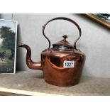 A Victorian copper kettle