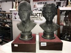 A pair of Royal Doulton busts of Elizabeth II and Prince Philip commemorating their Silver Wedding