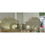 A large silver plate gallery tray, one other, a 4 piece silver plate tea set,
