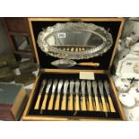 A boxed 12 piece fish / knife set by Rodgers Sheffield with marked 1893 silver collars (box has