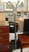 A chrome plated coat stand