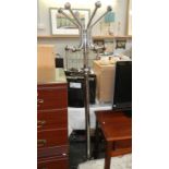 A chrome plated coat stand