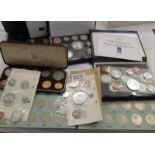 A quantity of UK coin sets.