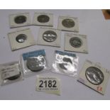 A collection of old coin tokens including Isle Of Man, Wales, Birmingham, Bristol, Banbury etc.