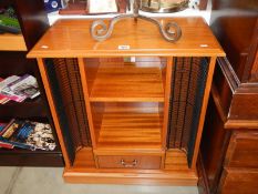A teak effect television /DVD stand