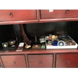 A box of miscellaneous including Wedgwood, lighters, picture frames etc.