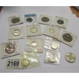 A small collection of George V and George VI coins including silver and 3 George II coins,.