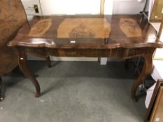 An ecclesiastical table inlaid with religious figures