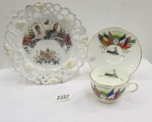 A WW1 Victory cup and saucer, a George V Coronation plate and one other plate.