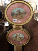 A pair of oval gilt framed equestrian watercolours