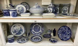 2 shelves of blue and white china and pottery (some A/F)