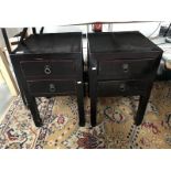 A pair of bedside drawers