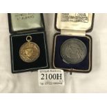 A cased silver gilt seed merchant medal 1909 and a rare Daily Mail Push Ball medal Lincoln 1930