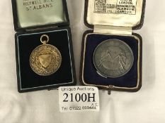 A cased silver gilt seed merchant medal 1909 and a rare Daily Mail Push Ball medal Lincoln 1930