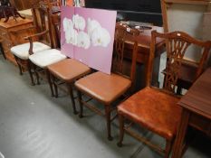 A set of 4 (plus a carver) Edwardian inlaid oak dining chairs