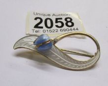 A silver and enamel Scandinavian brooch in white/blue enamel fashioned as a tulip, circa 1970's.