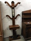 An Edwardian mahogany coat stand