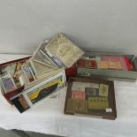 A mixed lot of post cards, cigarette cards, tea cards etc.