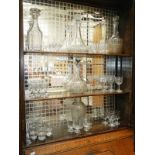 5 decanters and quantity of drinks glasses